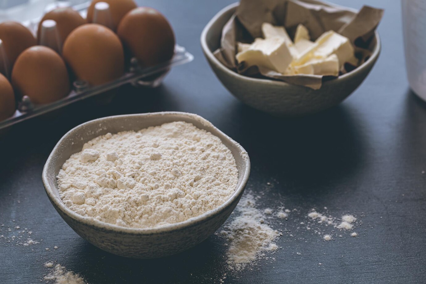 flour butter eggs kitchen table closeup 169016 26637