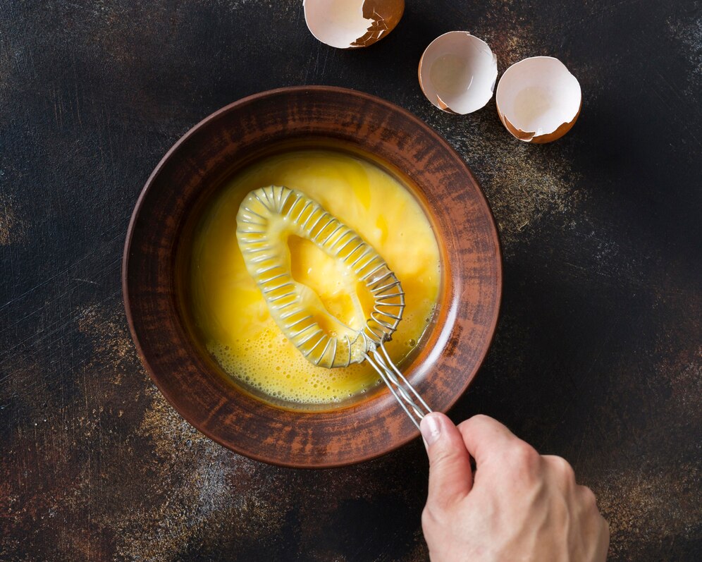 top view bowl with eggs yolk 23 2148601079