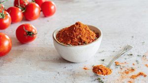 پودر گوجه چیست | چرا یکی از پرکاربردترین محصولات غذایی خشک شده است؟